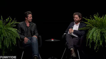 Brad Pitt spits gum at Zach Galifianakis after he makes Ross and Rachel joke about Angelina Jolie on 'Between Two Ferns' - WATCH